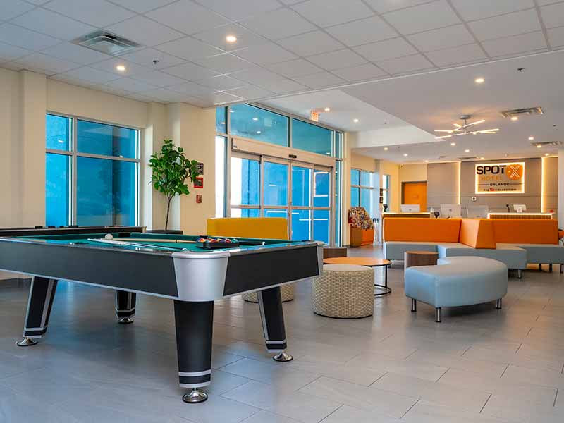 Orlando hotel lobby with pool table and sofas