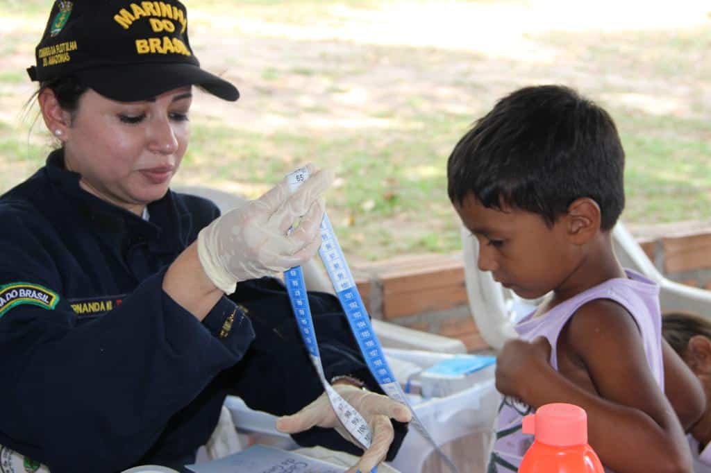 brazilian navy doctor and child in amazonas