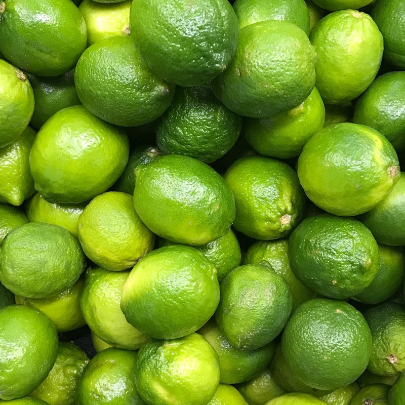 Several lemons covering a surface.