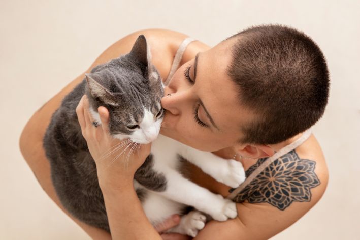 World Cat Day: owner kissing her kitten