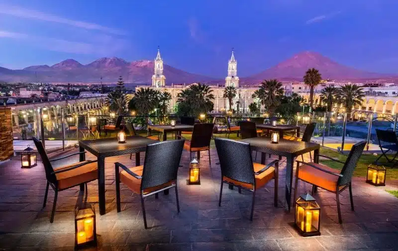 where to stay in Arequipa: photo shows hotel terrace, with views of the square and volcano