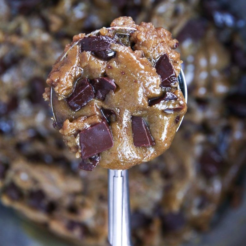 Raw cookie dough inside a spoon