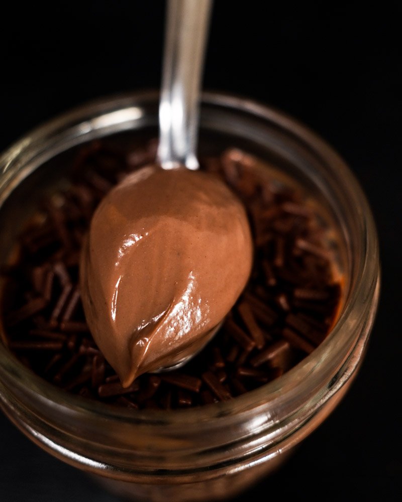 Little pot of brigadeirão in sous vide showing the texture.