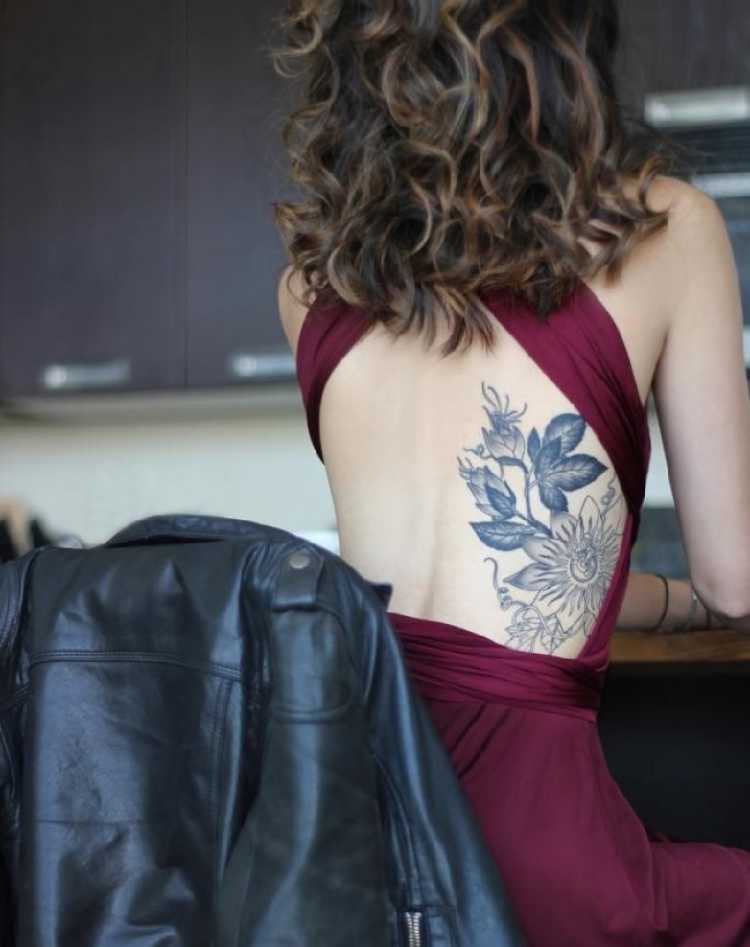 Female back tattoo