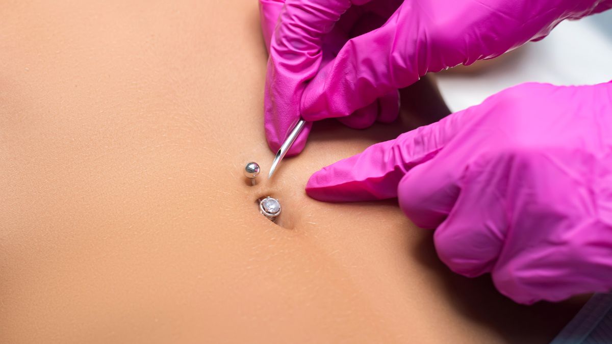 Piercing no Umbigo: O que Você Precisa Saber para Colocar