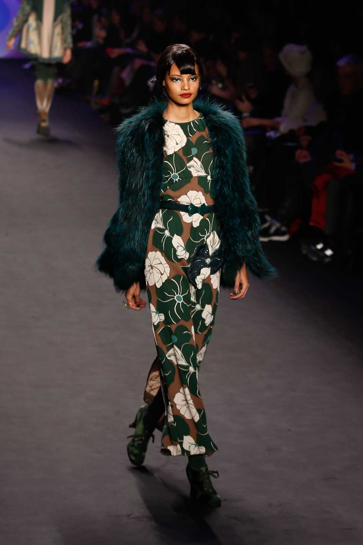 long green dress with fur coat