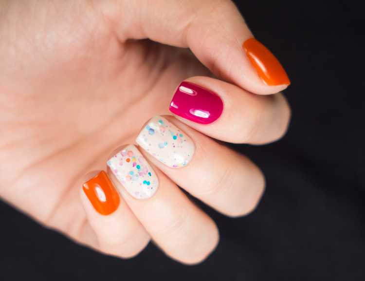 Nail decoration with fictional confetti and glitter