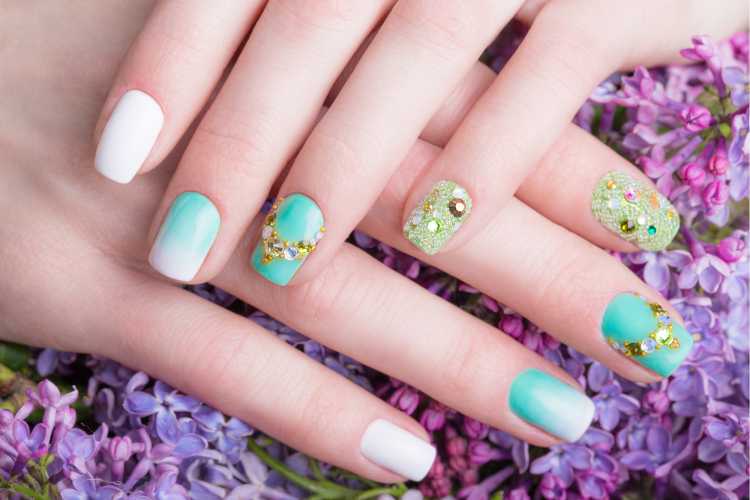 nail decoration with confetti and stones