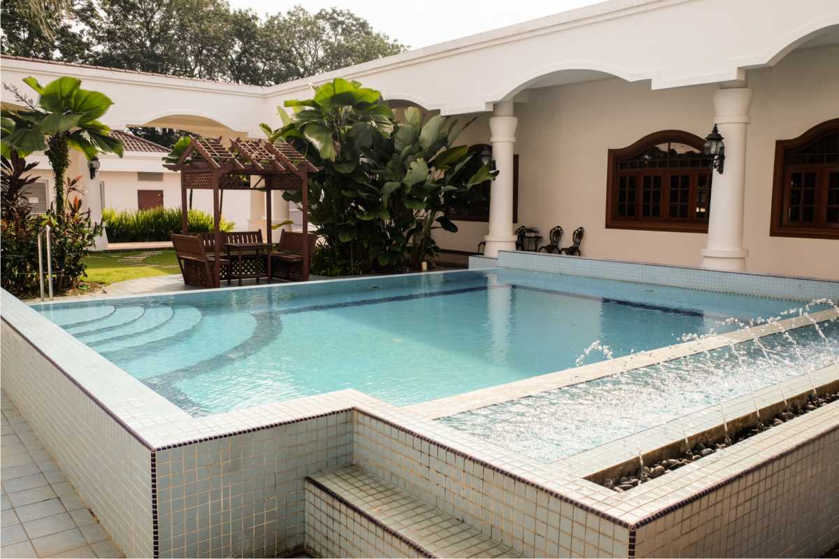 square swimming pool built above ground