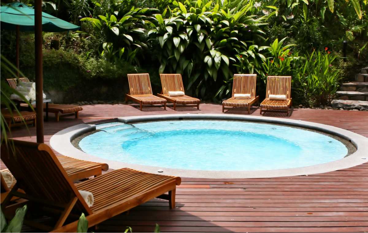 Small round pool on wooden deck