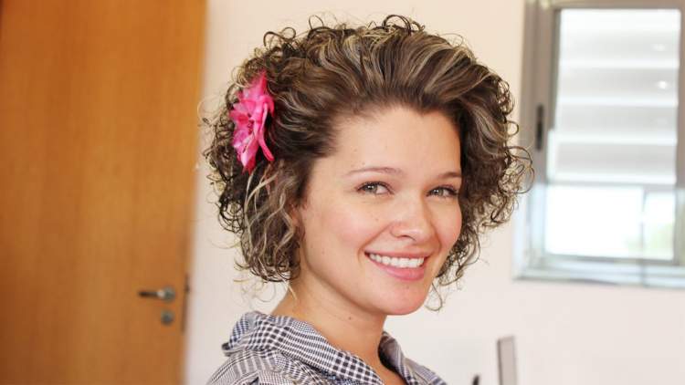 Side updo hairstyle for curly and short wet hair