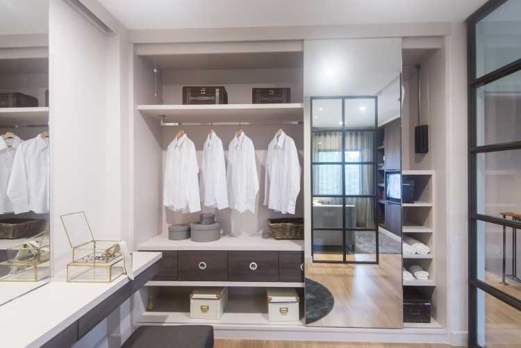 white closet with wooden details