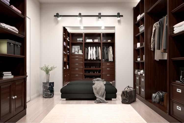 closet in antique, dark wood with light floor