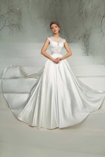 Wonderful wedding dress with silk skirt and embroidered cropped top