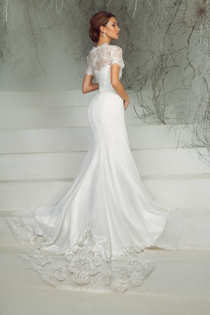 mermaid style wedding dress with lace details on the train