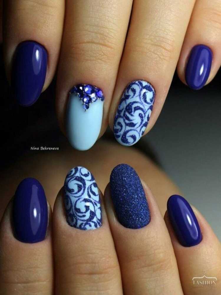 Nails decorated with blue nail polish