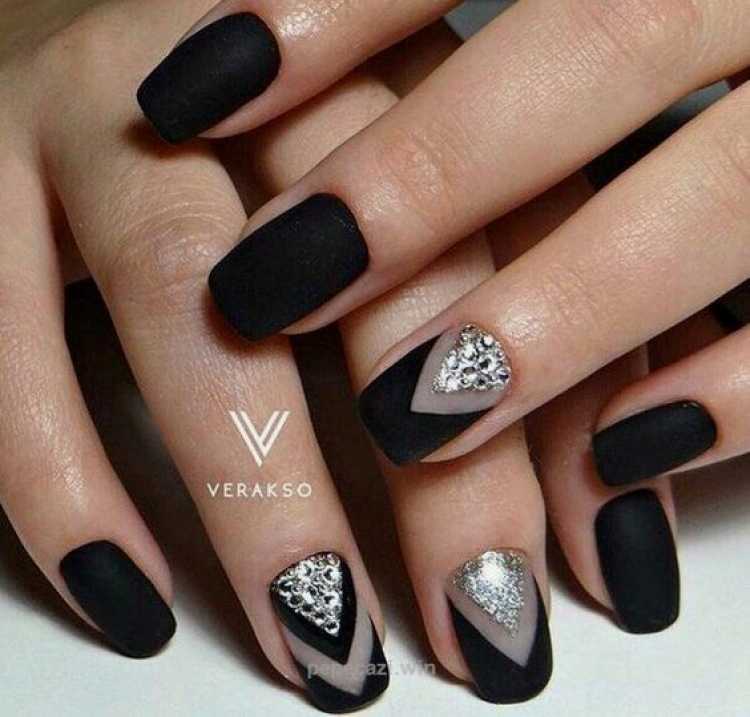 Nails decorated with black nail polish