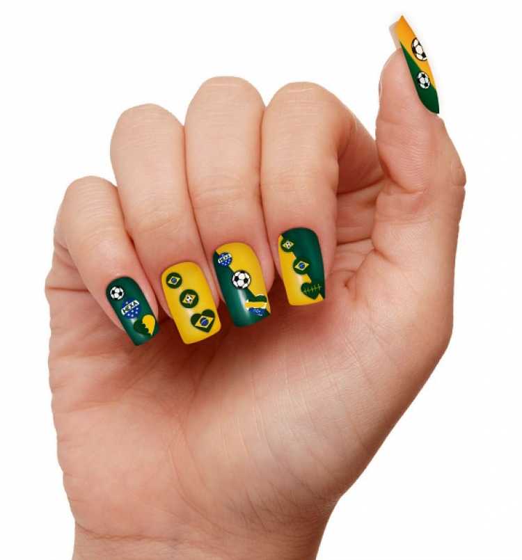 Nails decorated with stickers for the World Cup