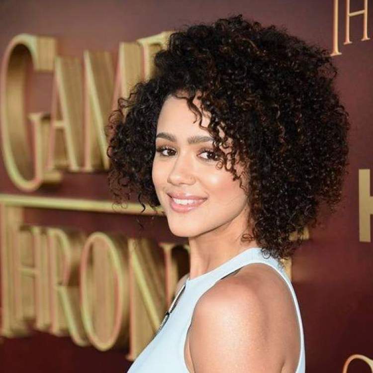 Short asymmetrical cut among the trends for curly hair 2018