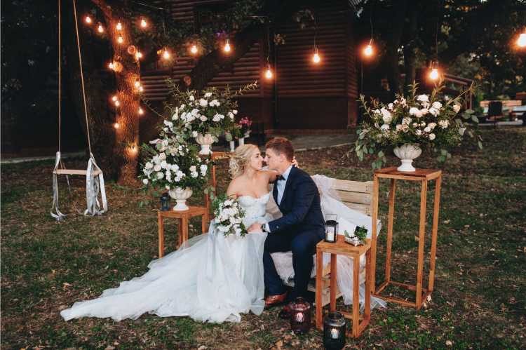 Happy couple celebrating their wedding at home