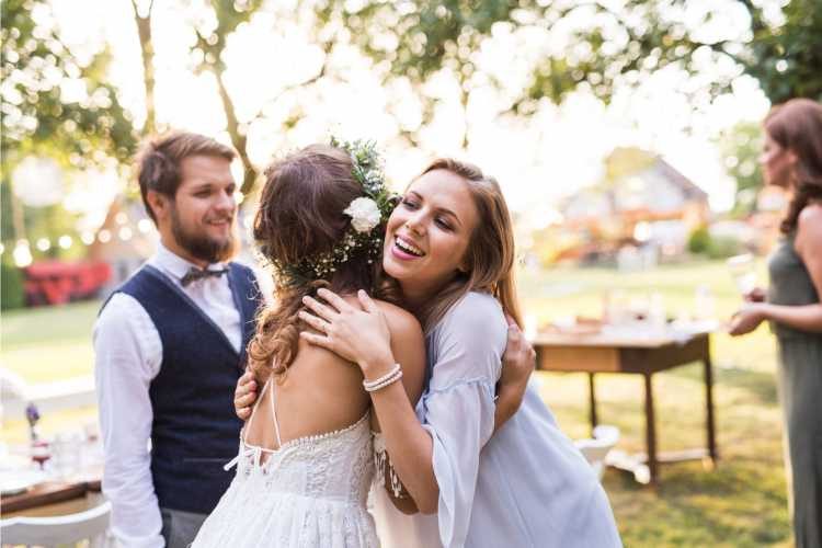 guests greeting bride and groom