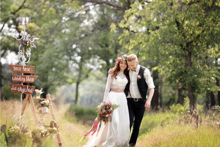 wedding dress with top and groom with vest