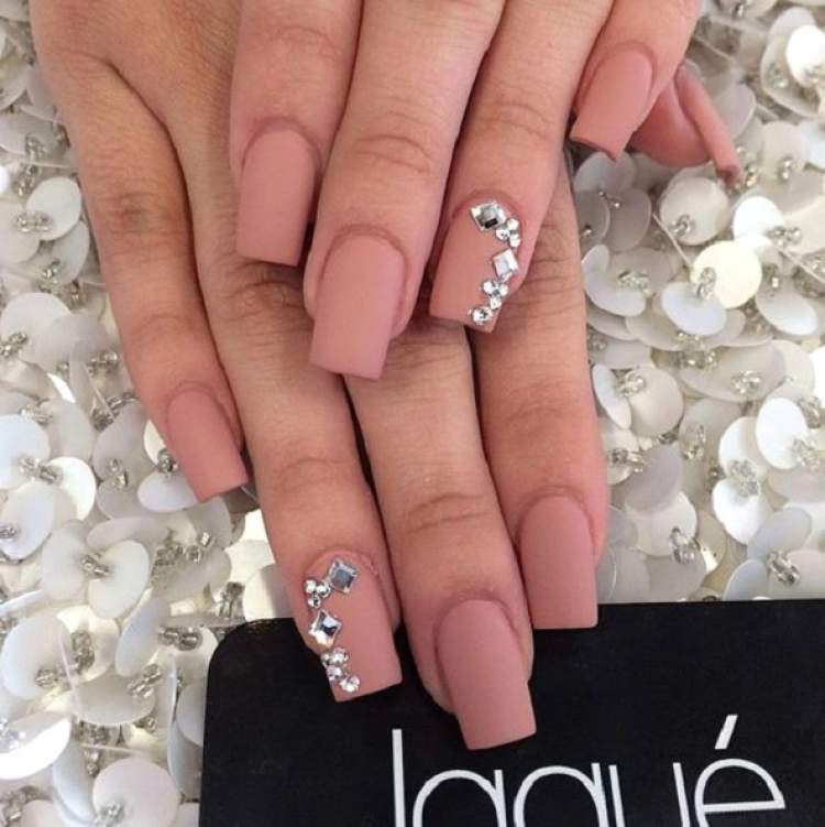 Rhinestones on decorated nails for those who love nude nail polish