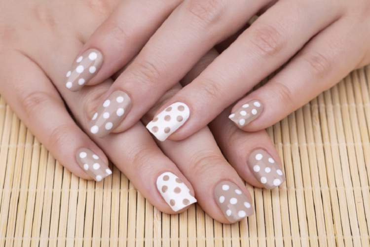 Polka dots on decorated nails for those who love nude nail polish