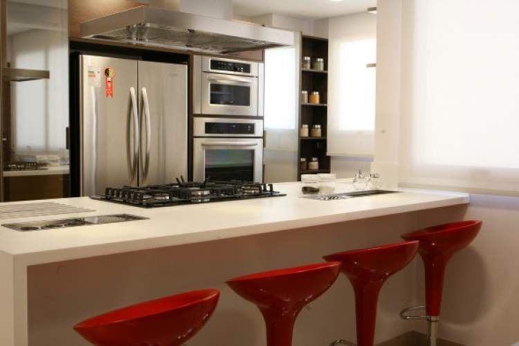 Modern kitchen counter that integrates table, sink and stove