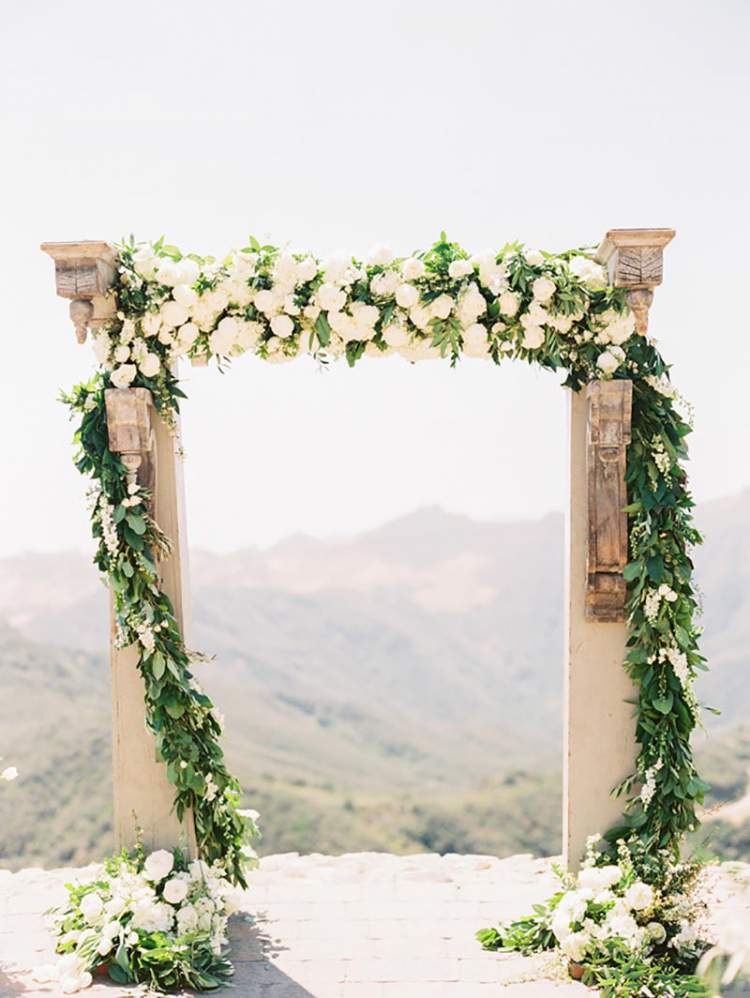 Beautiful arch of foliage in wedding decoration