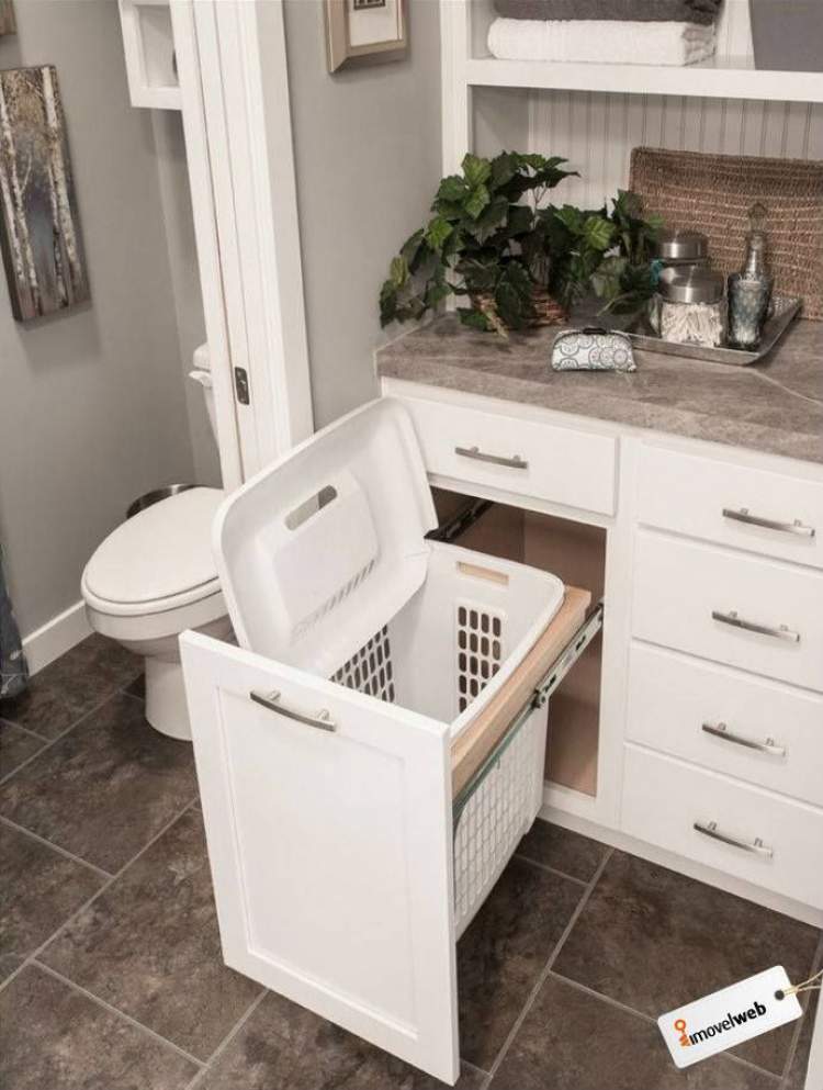 Laundry basket under the bathroom sink