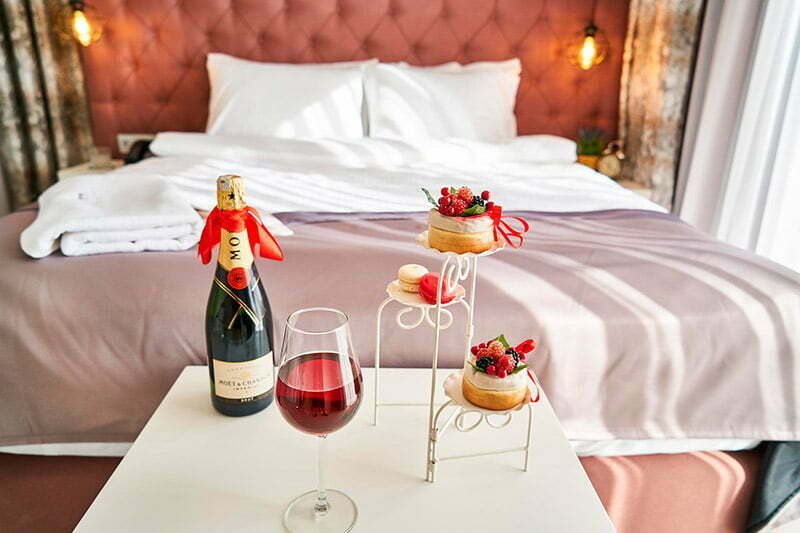 romantic surprise in hotel room for newlyweds