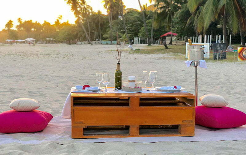 romantic dinner on the beach for newlyweds