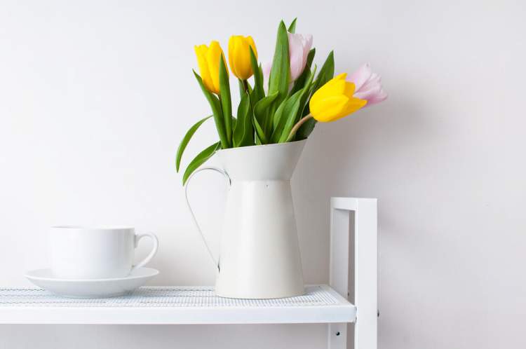 Use the milk jug as a flower vase