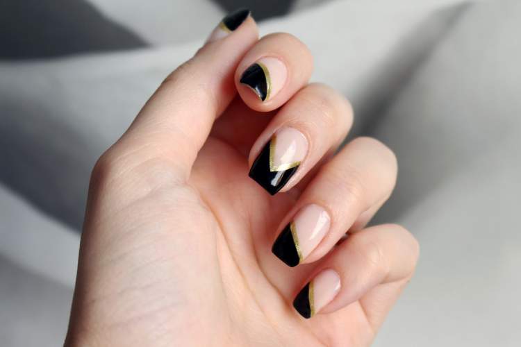 nails decorated with asymmetrical designs