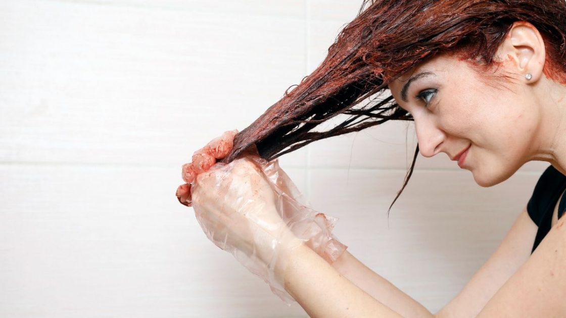 Woman dyeing her hair