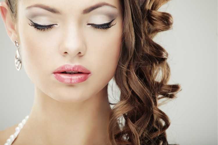 Bridal makeup with pink lipstick