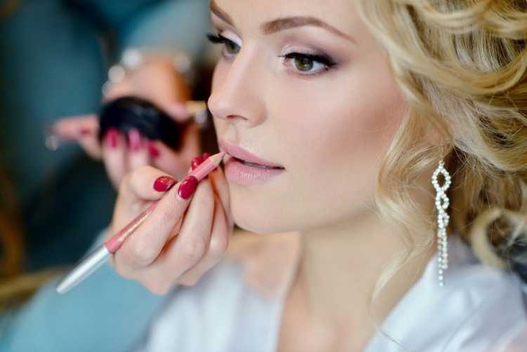 Blonde bridesmaid day wedding makeup