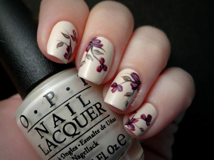 nails decorated with flowers