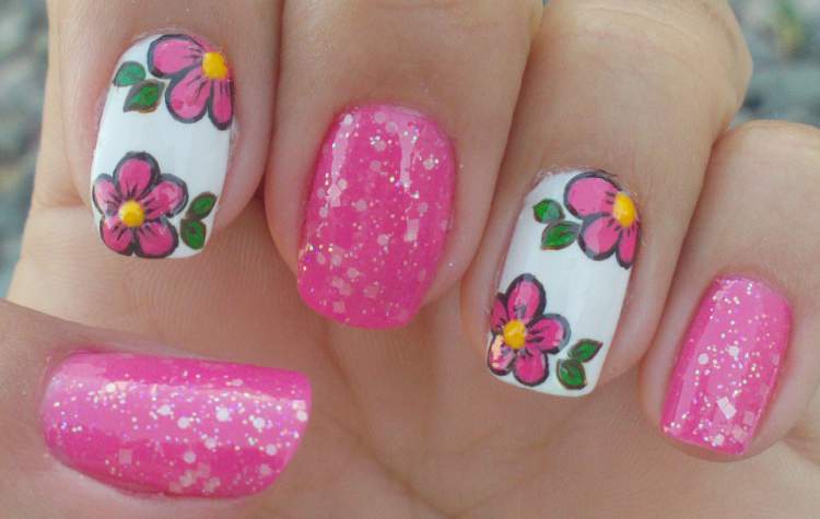 photo of nails decorated with flowers