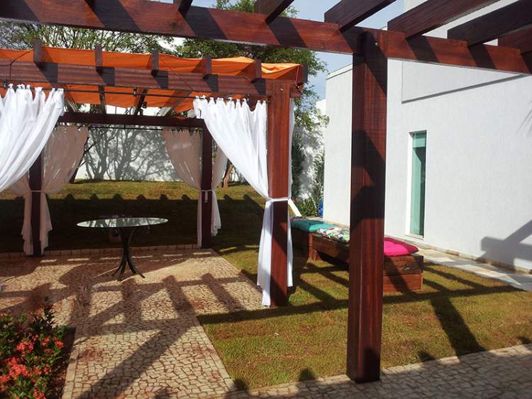 Pergola with fabric curtain