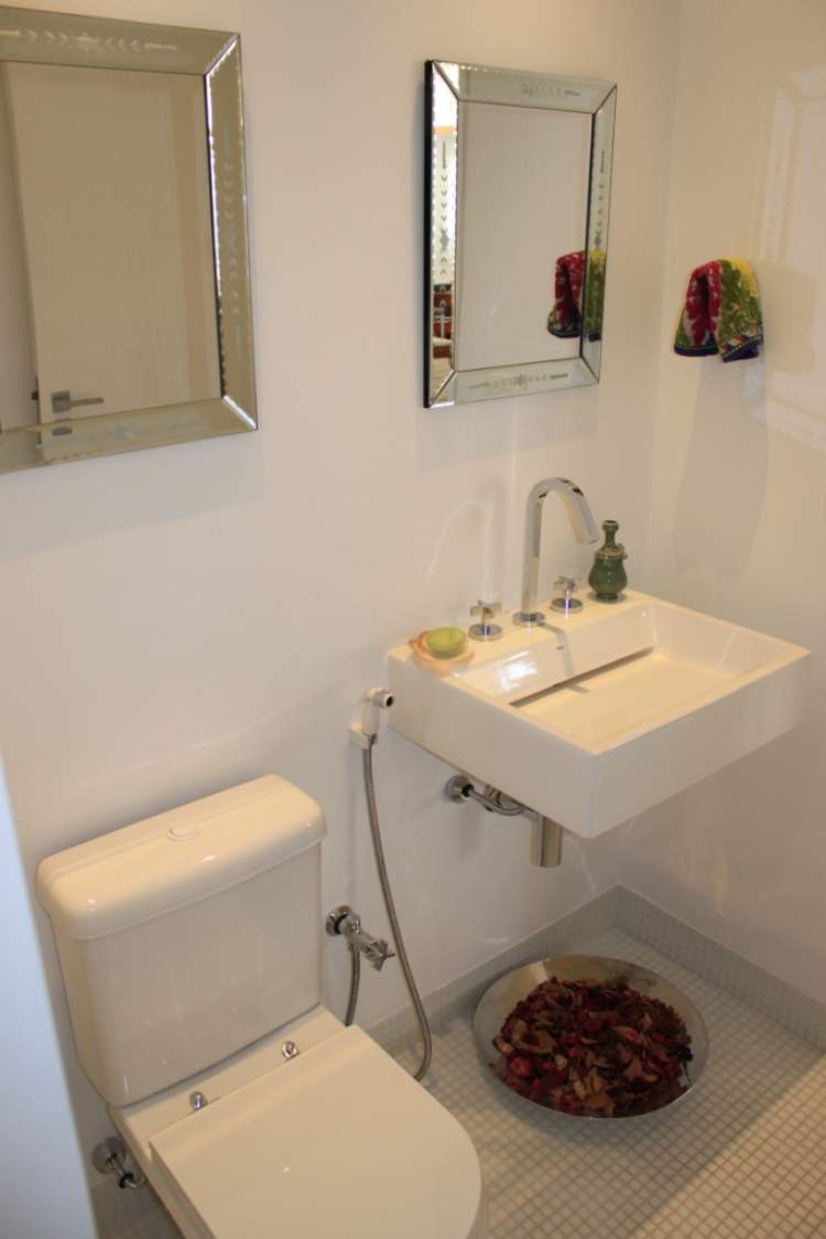 bathroom decorated with small mirrors