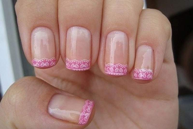 Photo of delicate French nails