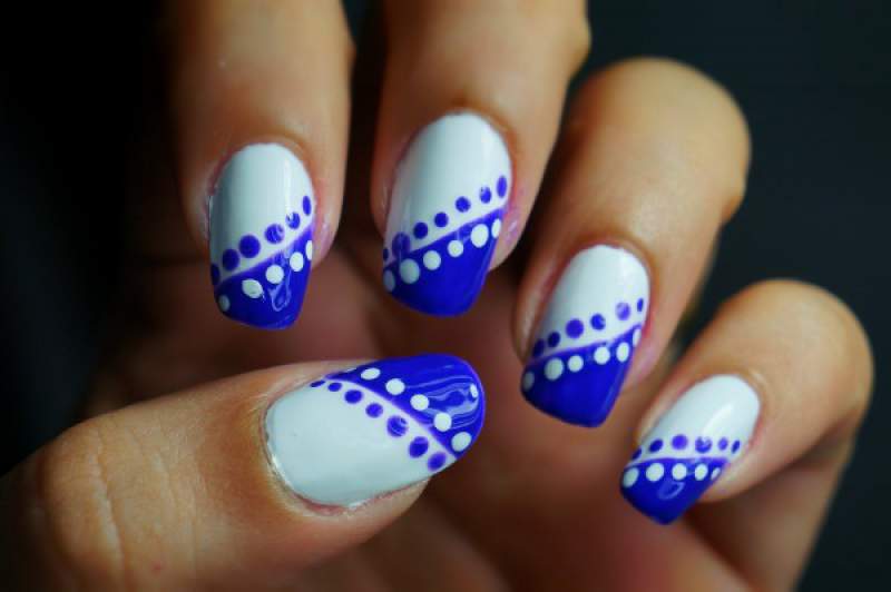 nail design decorated with polka dots