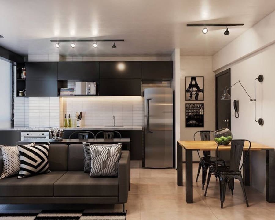 Living room, dining room and kitchen in black and white.