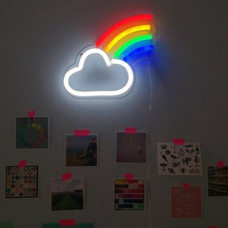LGBTQIA+ flag lamp on the wall.
