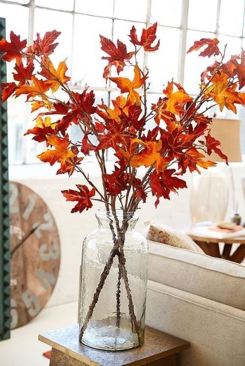 Vase with dry leaves