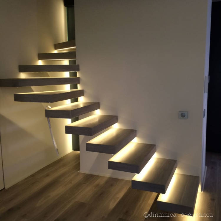 Illuminated L-shaped staircase.