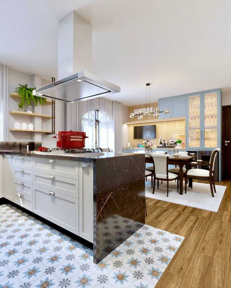 Light blue kitchen integrated with dining room.