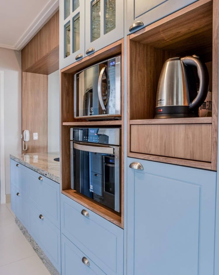 Blue cabinet with woody niches.